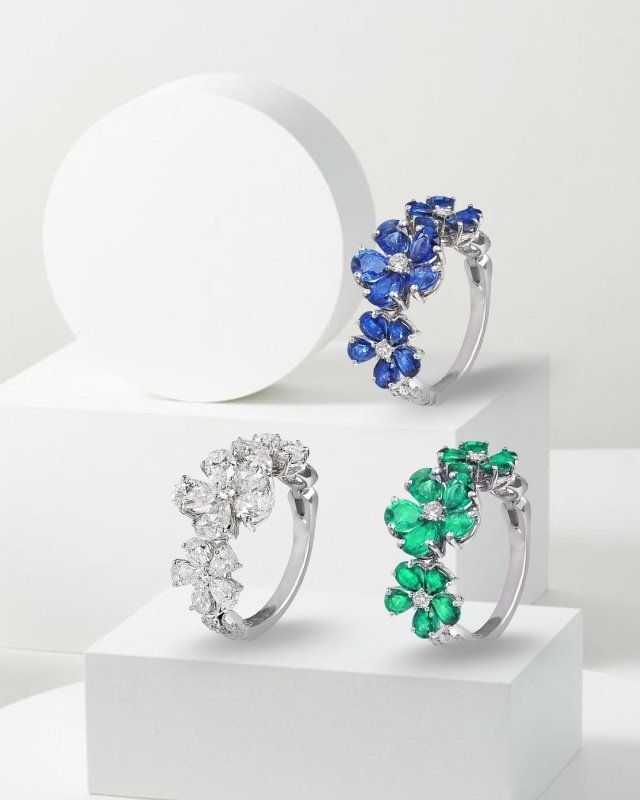 Bold and captivating, the Fleur D’Hiver rings from the ISTANA Private Collection bring Summer blooms to life . 

bold floral rings, gemstone statement rings, sapphire jewelry, emerald rings, winter-inspired accessories, luxury cocktail rings, ISTANA Privée Collection, floral gemstone design, standout fashion rings, high-end nature-inspired jewelry.